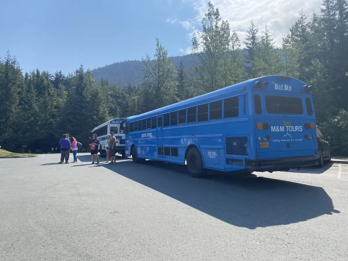 Nugget Falls and the glacier face seen during two hours of free time on the Mendenhall Glacier Express Blue Bus tour from the Juneau cruise terminal